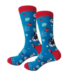 Detail view of cotton socks with festive Christmas patterns featuring snowflakes and animals