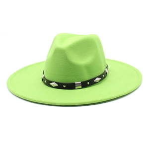 Detail of neon green wool fedora with black leather band and silver diamond rivets
