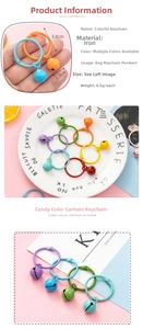 Macro shot of 1.3cm candy-colored bells and 3.0cm iron rings for DIY bag keychain accessories