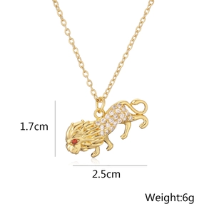 Detailed view of gold lion pendant with crystal accents showing 1.7cm by 2.5cm size