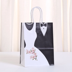 Wedding gift paper bags with black and white tuxedo and bridal gown illustrations
