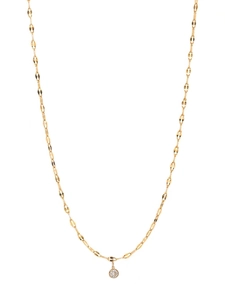 Detailed view of a gold-layered necklace with a round clear stone pendant on white background