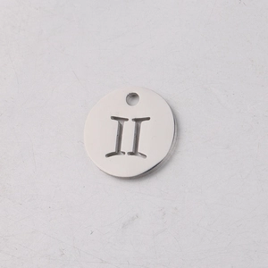 Macro detail of a 12mm silver stainless steel circular pendant with Roman numeral II