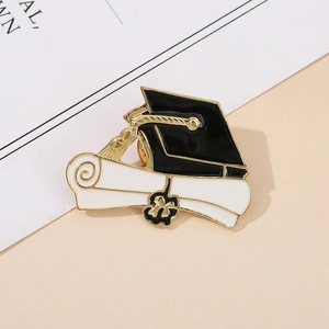 Elegant gold-plated graduation cap and diploma enamel brooch pin with tassels