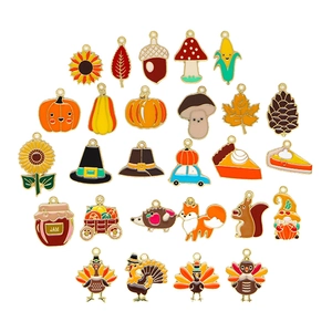 25-piece Thanksgiving enamel charms set featuring pumpkin, turkey and maple leaf motifs