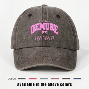 Distressed dark grey cotton baseball cap with Demure slogan print and bow design