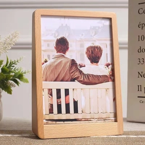 Minimalist light wood trapezoid photo frame with romantic couple picture for desk display