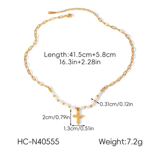 Detailed view of golden cross necklace dimensions with white beads and size labels