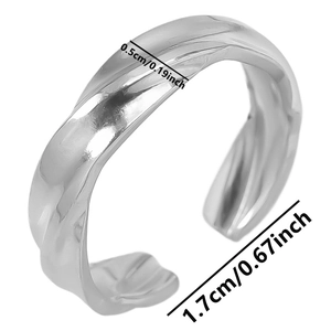 Macro shot of silver 304 stainless steel ring with twisted texture and size markings