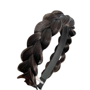 Handmade wide fishtail braid headband in dark brown synthetic hair on white background
