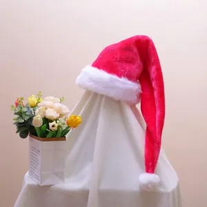 Detailed view of extra-long plush red Santa hat with thick white fur trim and soft pom-pom