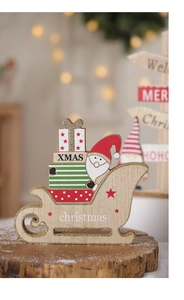 Close-up of wooden Christmas tabletop decor with glitter finish on rustic wood base