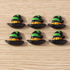 Flat lay of 6 resin wizard hat charms with green stripes for Halloween DIY crafts