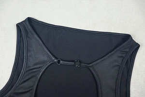 Close-up of black sleeveless dress collar with adjustable buckle and back cutout detail
