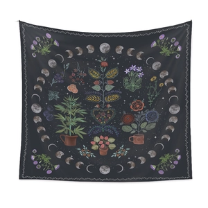 Bohemian moon phase tapestry with floral herb illustrations on a dark grey background