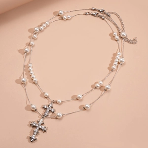 Double-layer pearl necklace with sparkling rhinestone cross pendants in gothic luxury style