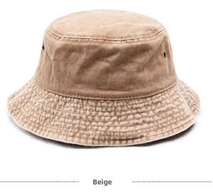 Close-up of beige washed denim bucket hat showing cotton texture and reinforced stitching
