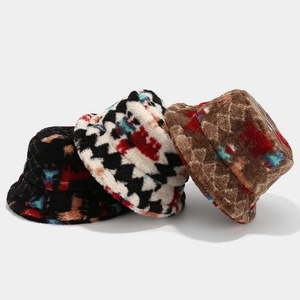 Thick plush bucket hat for winter featuring a colorful heart pattern and soft faux fur