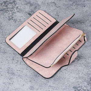 Pink faux leather long wallet for women featuring multiple card slots and zipper pocket