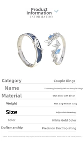 Macro detail of S925 silver whale and butterfly couple rings with zircon stone
