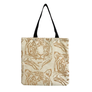 Close-up of beige tote bag fabric texture with brown tiger head line art print detail