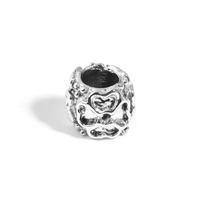 Detailed view of silver heart-shaped owl bead with intricate hollow pattern for DIY jewelry
