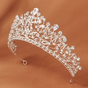 Exquisite silver tiara with sparkling crystal leaves and teardrop zircons for weddings
