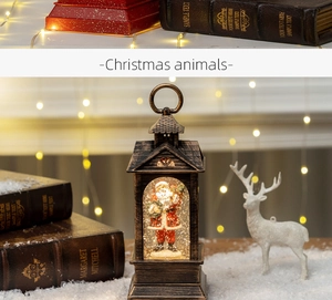 Close-up of a bronze Christmas lantern featuring Santa Claus and glitter inside