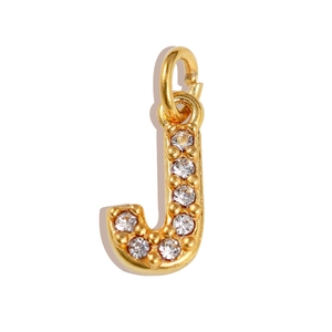 Macro shot of gold stainless steel letter J pendant with micro-pave cubic zirconia crystals