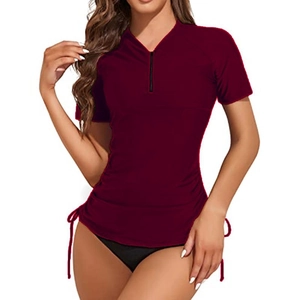 Women's burgundy short sleeve surfing top with zipper and adjustable drawstring sides