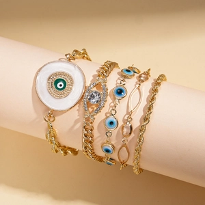 Parure de 5 bracelets vintage dorés avec œil protecteur émaillé et cristaux