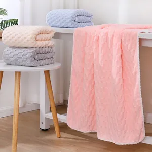 Thick coral fleece towels set with honeycomb texture in pink grey and blue colors