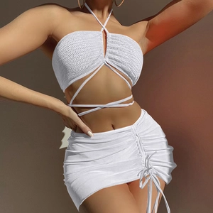 Three-piece white mesh bikini set with ruched drawstring skirt and halter top