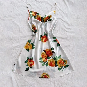 Floral satin backless dress with yellow rose prints and elegant draped neckline