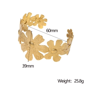 Detail view of gold floral bangle with dimensions 60mm diameter and 39mm width