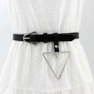 Detail of black leather waist belt featuring a silver triangle buckle and hanging pendant