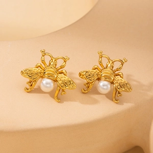 French vintage gold sea horse star earrings with white pearl detail for women