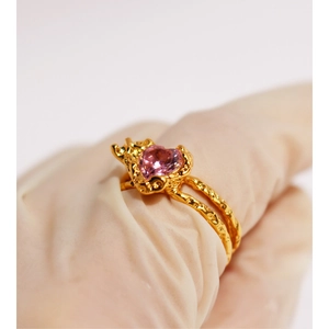 Adjustable golden open ring featuring a pink heart-shaped zircon gemstone for women