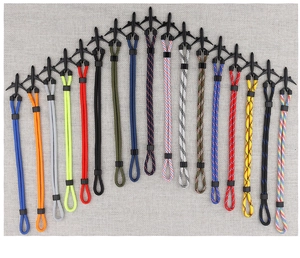 Detail of bicycle chain link style bracelets with airplane clips in assorted colors