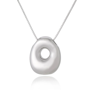 Detailed view of a silver oval hollow pendant on a fine link chain with soft reflection