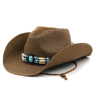 Detail der Strohtextur mit Türkisperlen und Western-Stil Hutband aus nächster Nähe