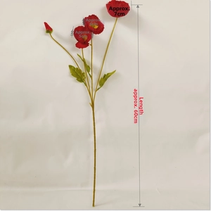 Detailed view of red artificial poppies with three blooming heads and one green bud
