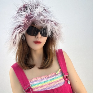 Close-up of premium purple and white faux sheep wool hat with fluffy plush texture