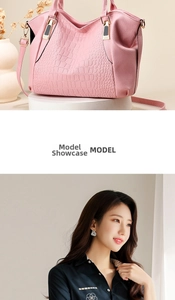 Pink crocodile pattern tote bag featuring gold-tone hardware and adjustable shoulder strap
