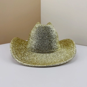 Detail of a sparkling gold metallic texture cowboy hat for St. Patrick's Day parties