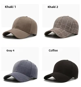 Detail view of textured fabric baseball caps in khaki, gray and coffee brown colors