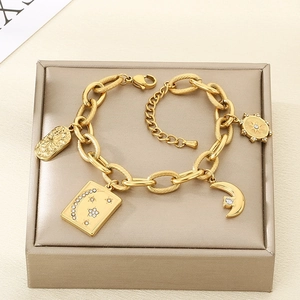 Bohemian style 18K gold plated chain bracelet with celestial tarot sun and moon pendants