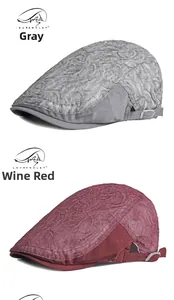 Detalle de sombreros grises y burdeos con relieve floral 3D y hebillas ajustables