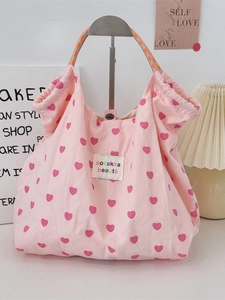 Pink heart canvas tote bag with woven straps for daily commuting and student use