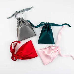 Satin drawstring gift bags in grey, green, red and pink for jewelry or cosmetics